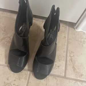 Black leather shoes with heel